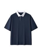 Polo à col contrasté : style preppy chic