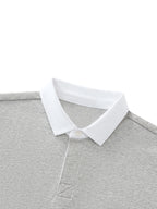 Polo à col contrasté : style preppy chic